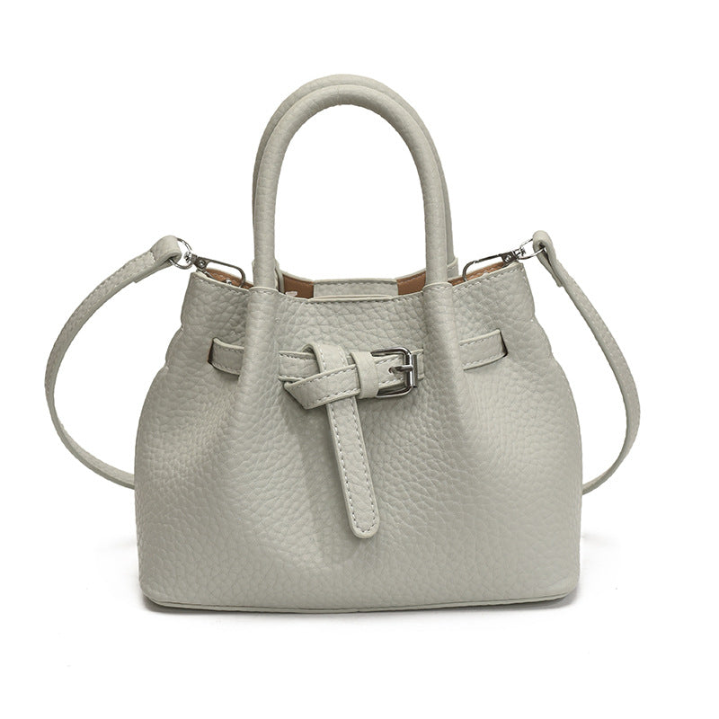 Damen Mini-Handtasche mit stylischem Druckknopfverschluss