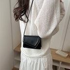 Damen Mini-Handtasche mit eleganter Verschlussmechanik