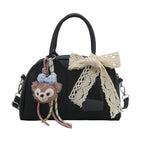 Damen Mini-Handtasche mit verspieltem Tiermotiv und charmantem Anhänger