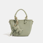Damen Mini-Handtasche mit verspieltem Tieranhänger