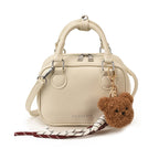 Damen Mini-Handtasche mit süßem Anhänger