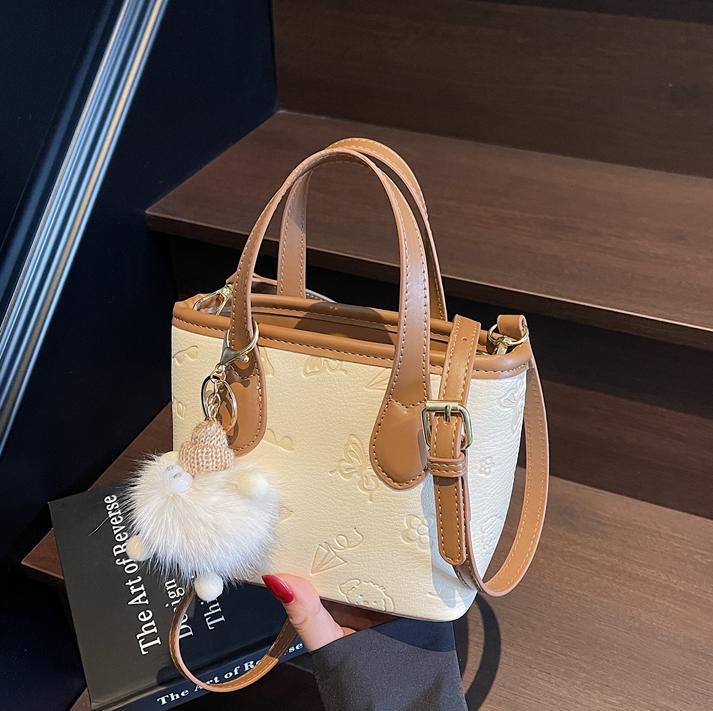 Damen Mini-Handtasche mit süßem Anhänger