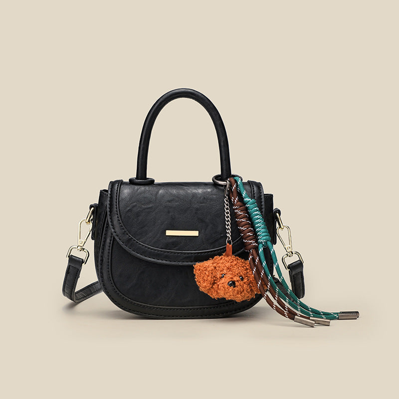 Damen Mini-Handtasche mit verspieltem Detail und hochwertigem Kunstleder
