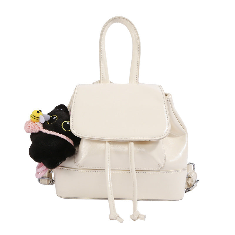 Damen Mini-Rucksack mit verspieltem Anhänger