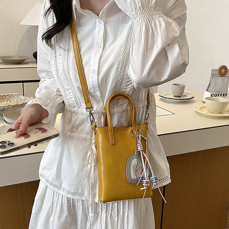Damen Mini-Handtasche mit elegantem Anhänger