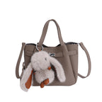 Damen Mini-Handtasche mit verspieltem Design und Tieranhänger