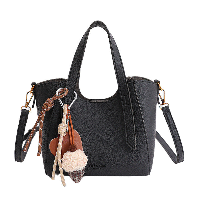 Damen Mini-Handtasche in elegantem Design mit charmantem Anhänger