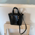 Damen Mini Tasche mit eleganter Struktur und praktischem Tragegriff