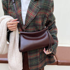 Elegante Schultertasche für Damen mit modernem, kurvigen Design