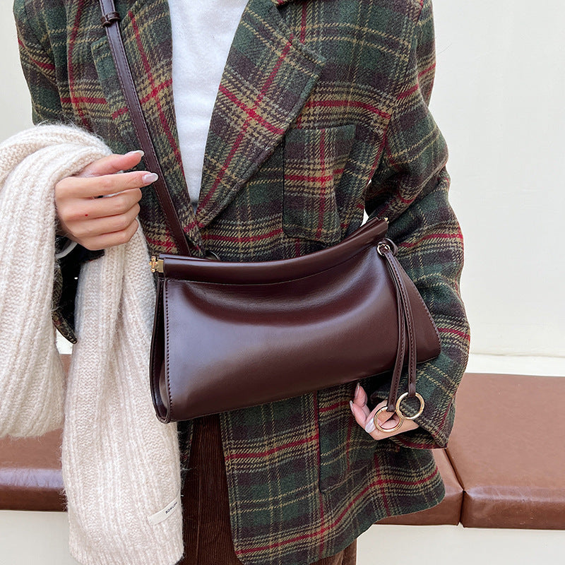 Elegante Schultertasche für Damen mit modernem, kurvigen Design