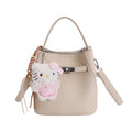 Damen Mini-Handtasche mit süßem Anhänger