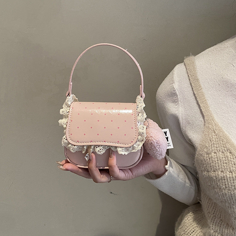 Damen Mini-Handtasche mit verspieltem Design und einzigartigen Details