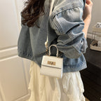 Damen Mini-Tasche mit elegantem Krokodil-Look und goldenen Akzenten