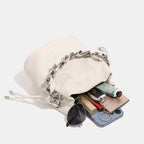 Damen Mini Rucksack Tasche mit elegantem Kettenhenkel und feiner Textur