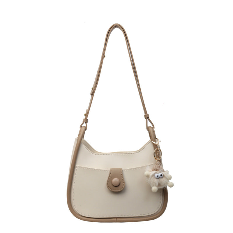 Damen Schultertasche aus hochwertigem Kunstleder mit verspieltem Charme