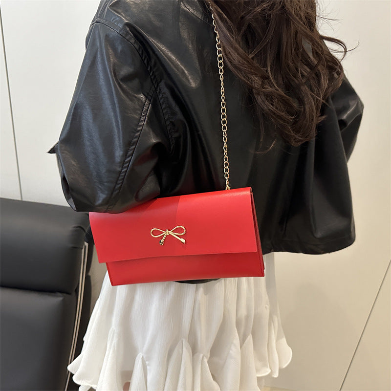 Damen elegante Clutch im minimalistischen Design mit goldenen Akzenten