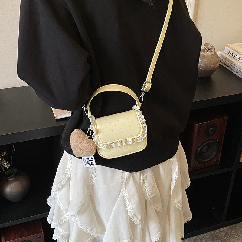 Damen Mini-Handtasche mit verspieltem Design und einzigartigen Details