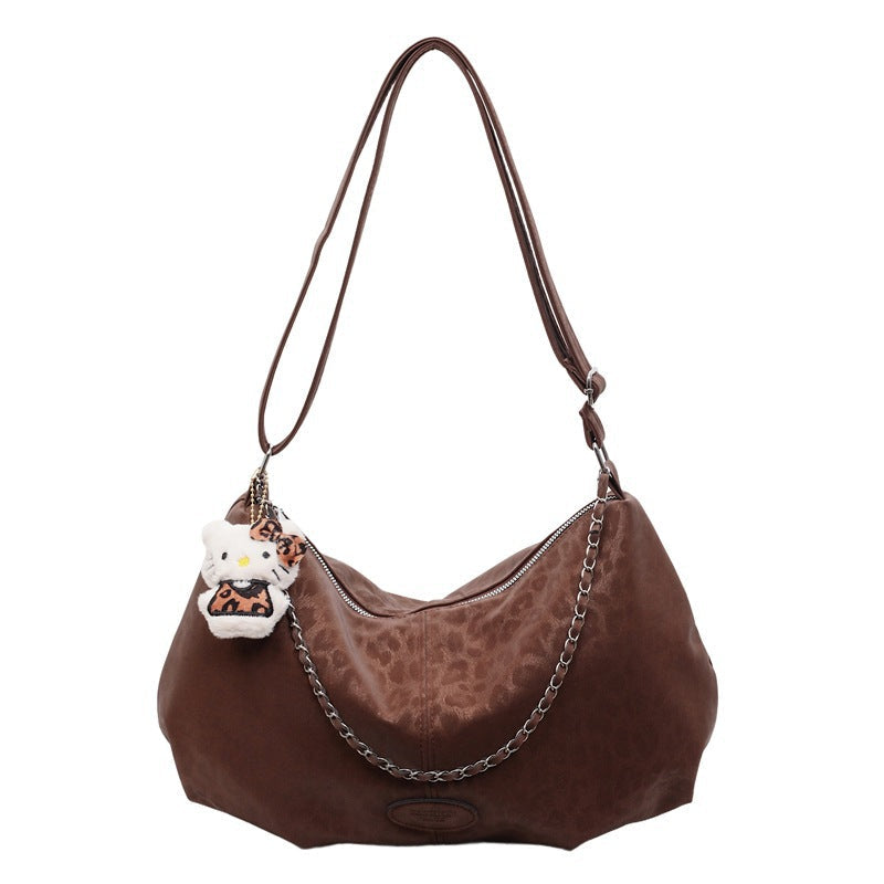 Damen elegante Hobo-Tasche aus strukturiertem Kunstleder mit abnehmbarem Anhänger