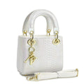 Damen elegante Mini-Handtasche im modernen Schlangenhaut-Look mit abnehmbarem Schultergurt