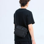 Verstellbare kompakte Sling Bag Emma Tasche