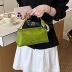 Damen elegante Handtasche mit minimalistischem Design und edlen Akzenten