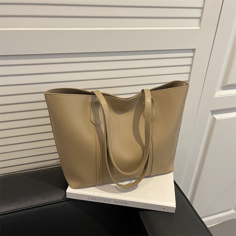 Damen elegante Tragetasche mit minimalistischer Struktur