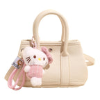 Damen Mini-Handtasche mit verspieltem Plüschanhänger