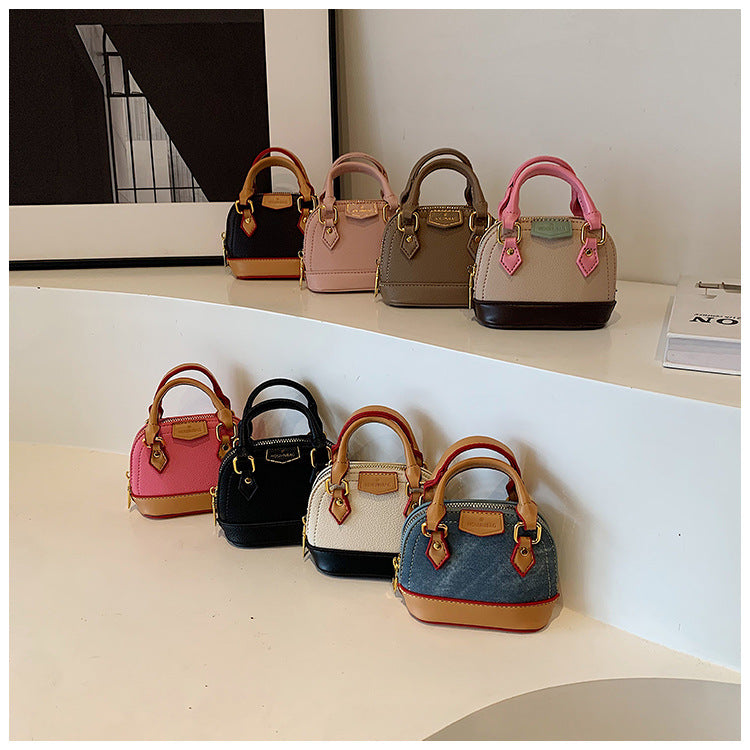 Damen Mini Hobo Tasche aus strukturiertem Kunstleder mit goldenen Akzenten