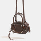 Damen Mini-Handtasche mit verspieltem Kordelzug und eleganten Akzenten