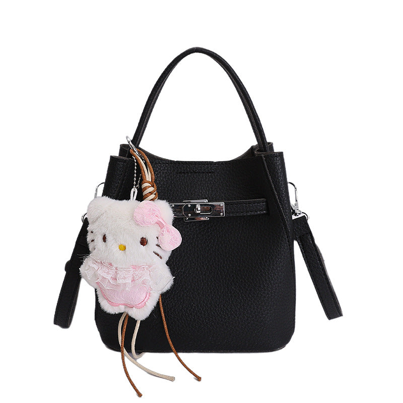 Damen Mini-Handtasche mit süßem Anhänger