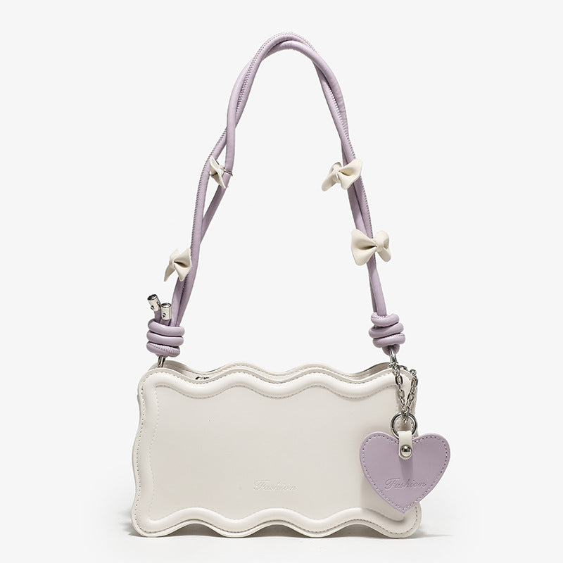 Damen Mini-Handtasche mit kreativem Wellenmuster und verspieltem Anhänger