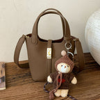 Damen Mini-Handtasche mit verspieltem Tieranhänger