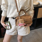 Damen Mini-Handtasche mit charmantem Tieranhänger