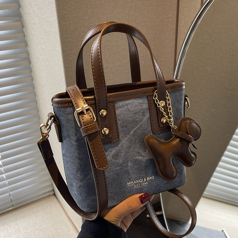 Damen Mini-Handtasche mit abnehmbarem Charm