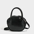Damen Mini-Handtasche mit luxuriösen Lederakzenten