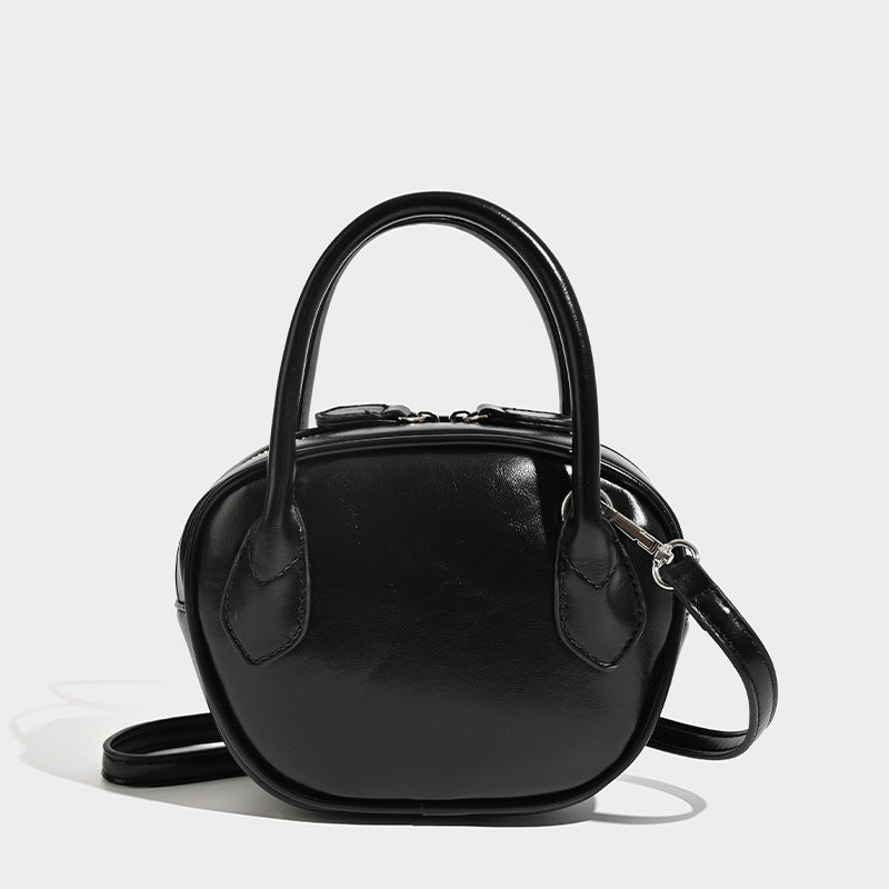 Damen Mini-Handtasche mit luxuriösen Lederakzenten