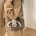 Damen Mini-Handtasche mit verspieltem Design und Tieranhänger