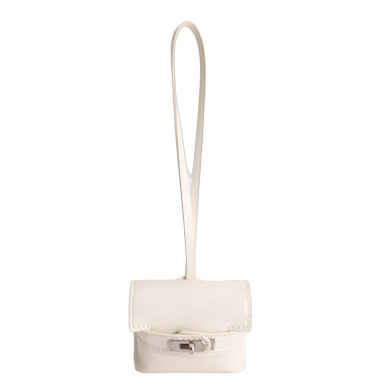 Damen Mini-Handtasche aus hochwertigem Kunstleder mit verspieltem Verschluss