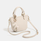 Damen Mini-Handtasche mit verspieltem Tieranhänger
