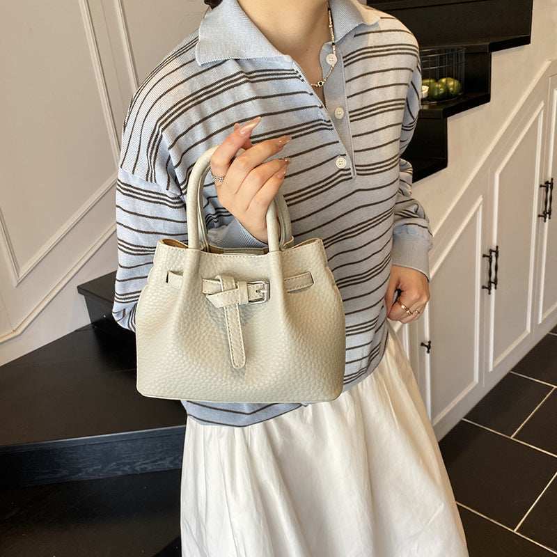 Damen Mini-Handtasche mit stylischem Druckknopfverschluss