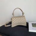 Damen Mini-Handtasche mit anspruchsvollem Logodesign