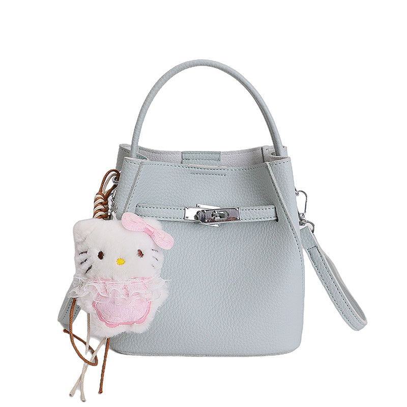 Damen Mini-Handtasche mit süßem Anhänger