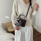 Damen Mini-Handtasche mit süßem Tier-Anhänger