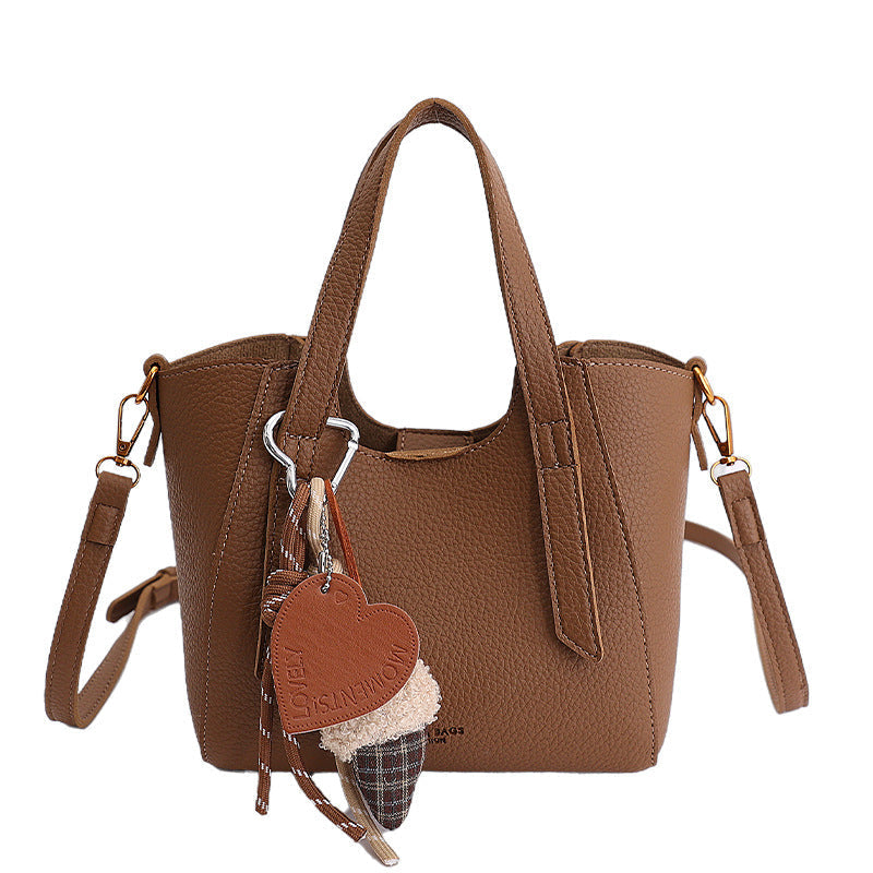 Damen Mini-Handtasche in elegantem Design mit charmantem Anhänger