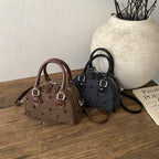 Damen Mini-Handtasche aus hochwertigem Material mit einer strukturierten Oberfläche