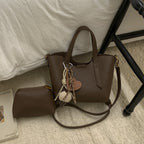 Damen Mini-Handtasche in elegantem Design mit charmantem Anhänger
