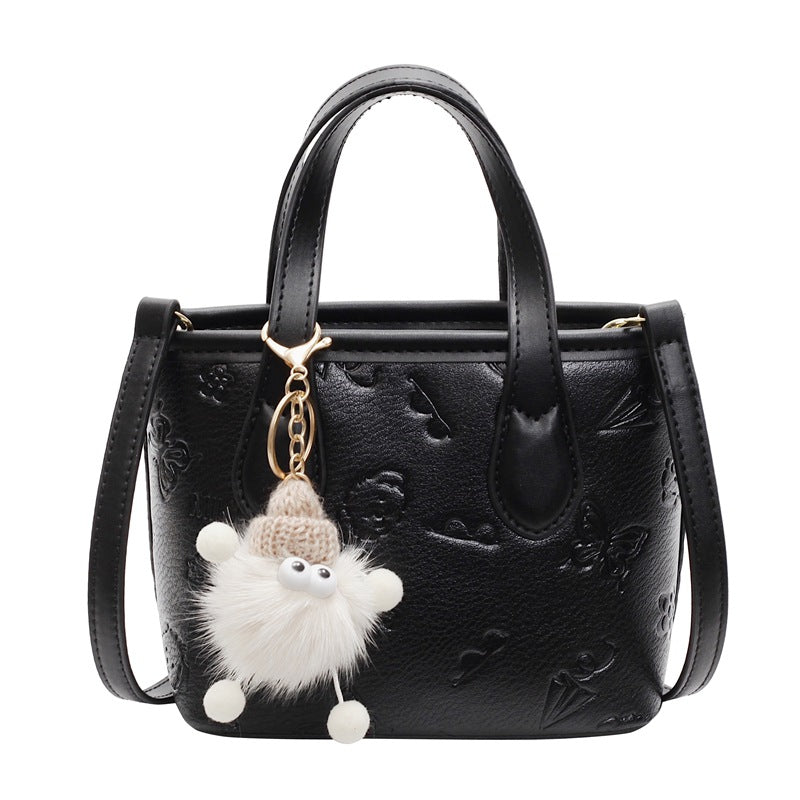 Damen Mini-Handtasche mit süßem Anhänger