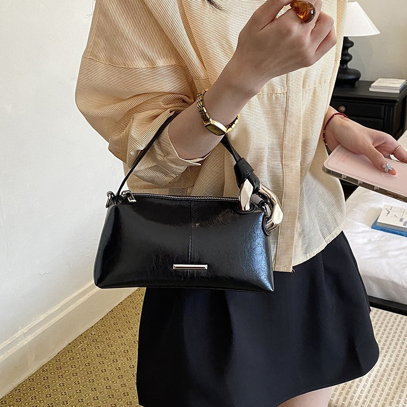 Damen elegante Handtasche mit minimalistischem Design und edlen Akzenten
