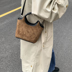 Damen elegante Handtasche aus hochwertigem Wildleder und Lederakzenten