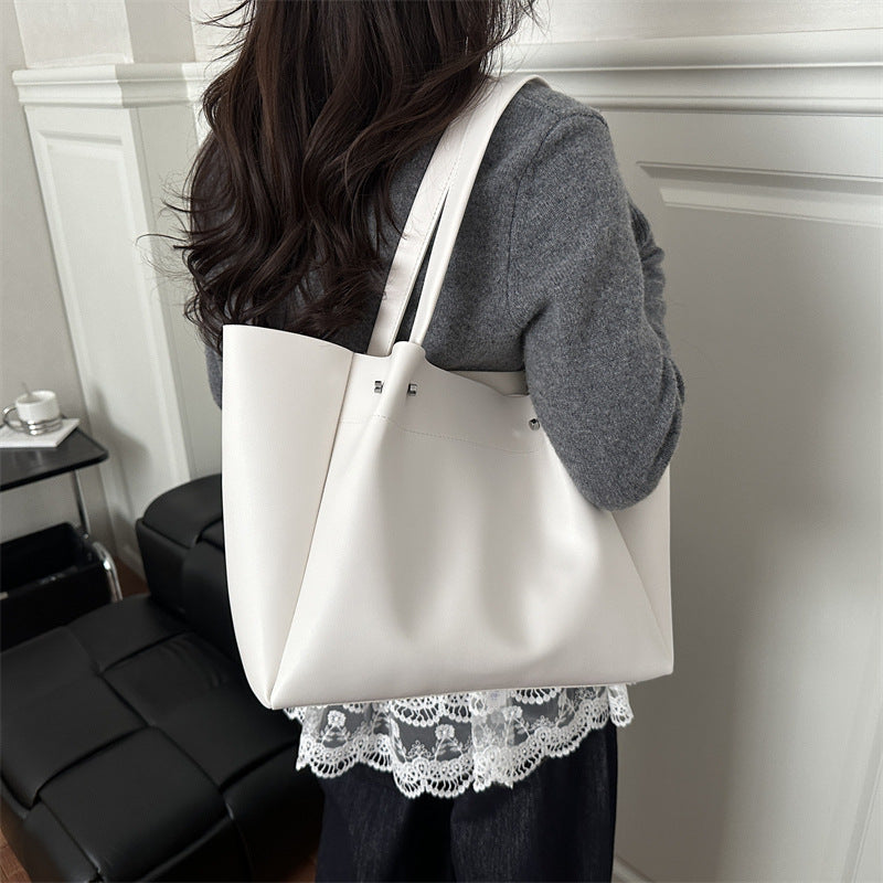 Damen-Umhängetasche mit elegantem minimalistischen Design und stabilen Tragegriffen